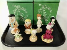 Seven John Beswick The Flintstones figures, boxed.