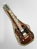 A Grant electric guitar in soft carry bag