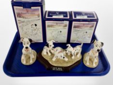 Three Royal Doulton 101 Dalmatians figures, boxed.