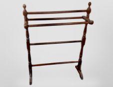 A 19th century beech towel rail,