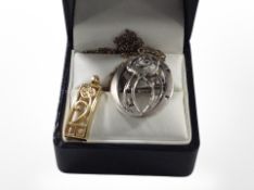 An Art Nouveau-style silver brooch designed by Charles Rennie Mackintosh,