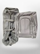 A contemporary hold-all and further luggage case.