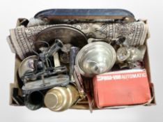 A box containing metal wares, silver-plated cruet stand, cutlery, cocktail shaker, Bokhara rug,