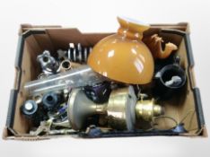 A box containing brass oil lamp with chimney and opaque orange glass shade,