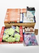 Two boxes containing children's boardgames, headbands, soft toys, etc.