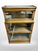 A Globe-Wernicke glazed oak three tier stacking bookcase,
