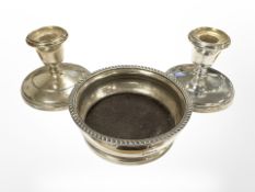 A pair of loaded silver dwarf candlesticks, Birmingham marks, height 7cm,