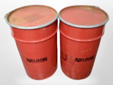 Two metal barrels,