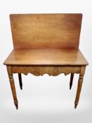 A 19th century mahogany tea table,