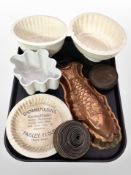 A copper-plated jelly mould in the form of a fish,