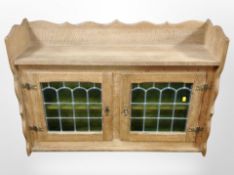 A Danish blonde oak leaded glass door wall cabinet,