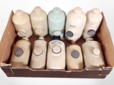 A group of 19th-century pottery hot water bottles.