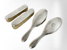 An Edwardian silver four-piece dressing table set, William Hutton & Sons Ltd,