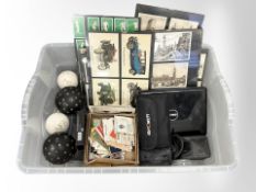 A group of framed postcards and cigarette cards, together with two pairs of field binoculars,