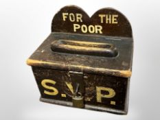 A 19th-century painted pine charity donation box, width 23cm.