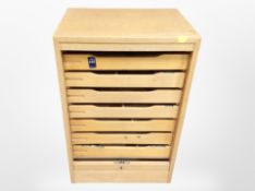 An early 20th-century Danish oak tambour-front office filing cabinet, 51cm x 37cm x 76cm, with key.