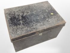 An antique tin trunk.