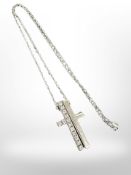 A split silver crucifix on chain, marked Gucci.