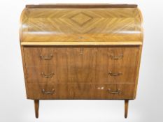 A 20th-century Danish teak cylinder-front bureau, 90cm x 47cm x 96cm.