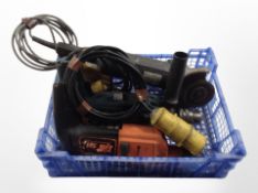 An angle grinder and two power drills.