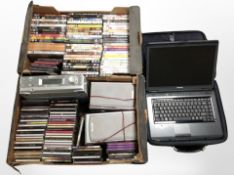 Two boxes containing assorted CDs, digital synthesizer tuner system, pair of speakers,