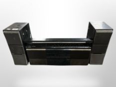 A Bang and Olufsen Beosystem 10, together with a pair of Beovox C75 speakers.