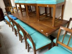 A 20th-century teak rectangular dining table on painted support, 201cm x 73cm x 76cm.