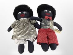 Two Golly soft toys.