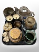 A group of 20th-century Danish studio pottery including teapot, tankards, and other vessels.