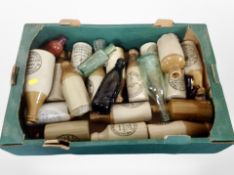 A collection of pottery and glass bottles,