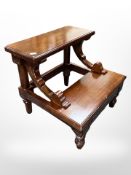 A reproduction mahogany library step, 44cm x 40cm x 40cm.