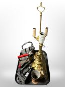 Two brass lamp bases, three irons, hammered brass wall sconce, etc.