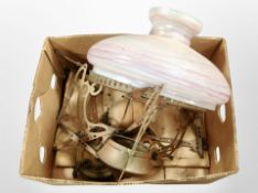 An early 20th-century copper and glass hanging oil lamp.