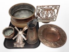 A group of copper wares including hammered copper jardiniere, further embossed jug,