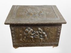 An embossed copper coal bin, width 50cm.
