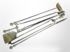 A group of 19th-century brass fire companion pieces.