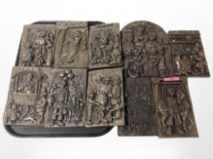 Ten Robert Olley relief plaques.
