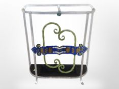 An early 20th-century painted metal umbrella stand, height 46cm.