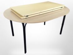 A late 20th-century Scandinavian oval extending dining table with two leaves,