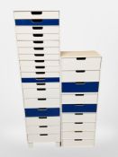 Two 20th-century laminated wood filing chests, each 35cm wide.
