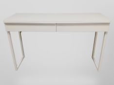 A contemporary white-gloss two-drawer rectangular table, 120cm x 41cm x 74cm.