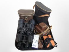 A pair of Royal 6x30 binoculars, one other pair, vintage camera, etc.