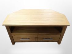A contemporary oak television stand, 90cm x 44cm x 48cm.