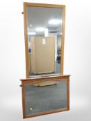 A teak-framed rectangular mirror, 160cm x 58cm, and a further carved oak overmantle mirror.