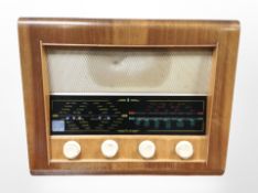 A Bush walnut-cased valve radio, width 50cm.