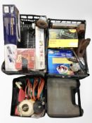 Two crates containing assorted power tools, vintage woodworking planes, hand tools, tile cutters,