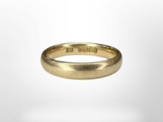 An 18ct gold band ring, size K CONDITION REPORT: 4.