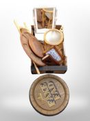 A box containing vintage Danish teak lazy susan, bread board, painted mirror, small bamboo stool,