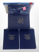 Fourteen decimal coin sets in wallets.