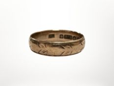 A 9ct gold band ring, size P. CONDITION REPORT: 3.1g.